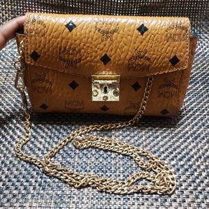 MCM millie visetos cross body bag.